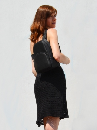 This beautiful crochet top is a practical choice for days when you want to be both chic and comfortable. It can be worn during pregnancy – it’s fitted at bust level with positive ease over your belly. The design allows to convert it into a knee length skirt. Back is made in one piece so that this garment widens towards the bottom. The central panel in front reminds of the fine craftsmanship – beautifully carved intricate geometric architectural ornaments. 